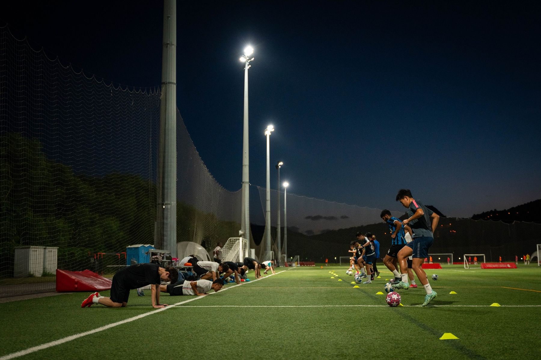 Evening training under floodlights