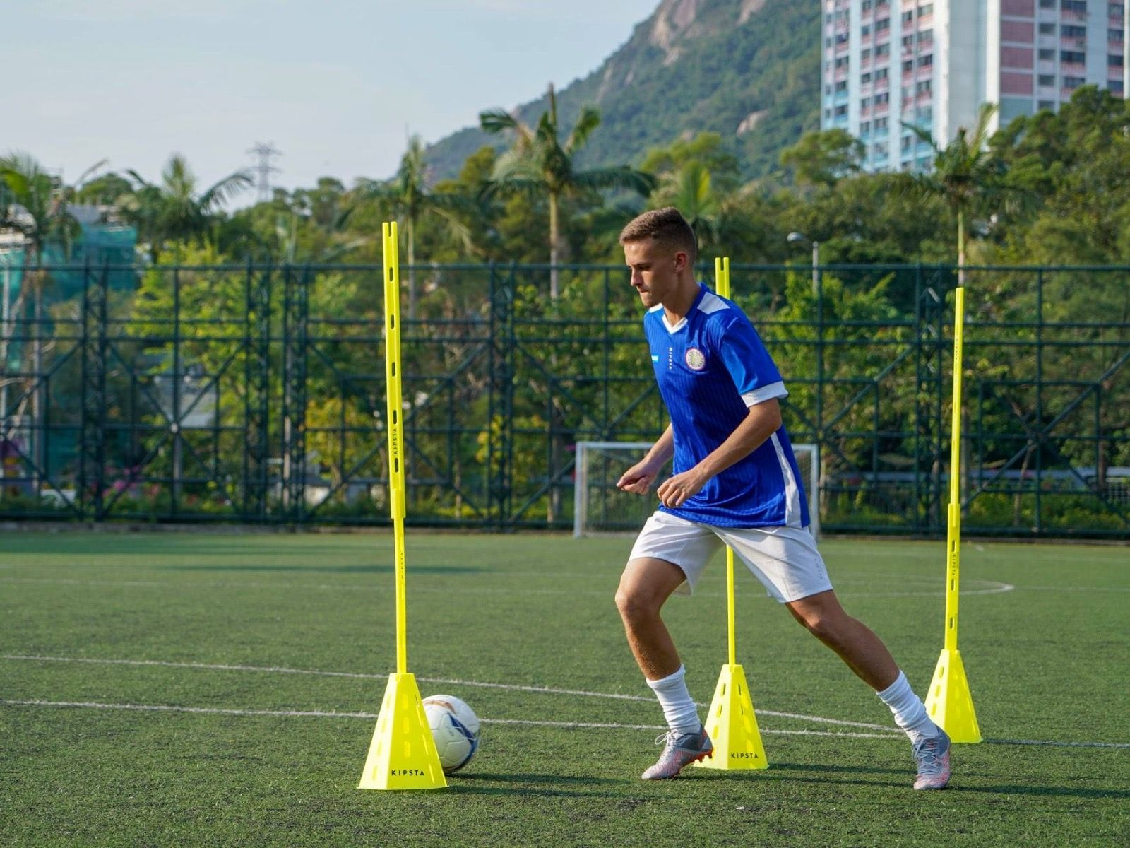 Agility drill through yellow poles